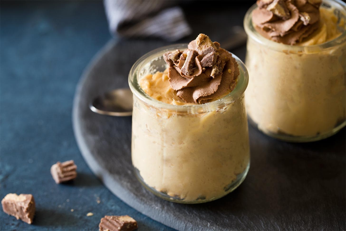 Peanut butter mousse in jars ready for serving