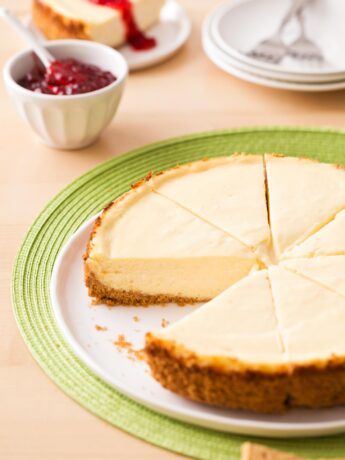 9 inch classic cheesecake cut into slices