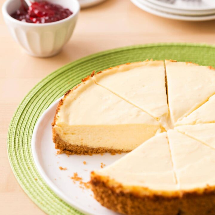 9 inch classic cheesecake cut into slices