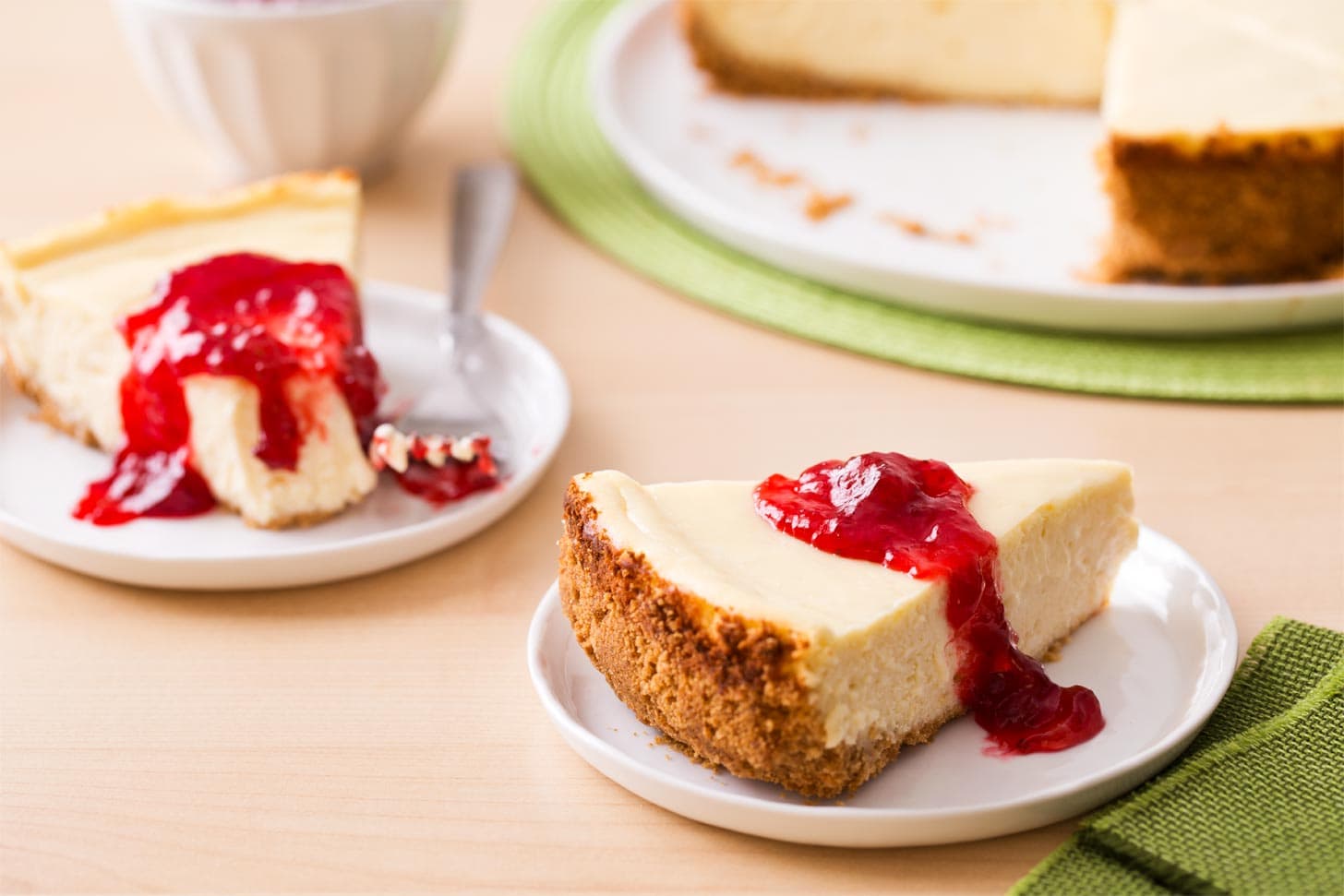 Slices of classic cheesecake recipe served on plates
