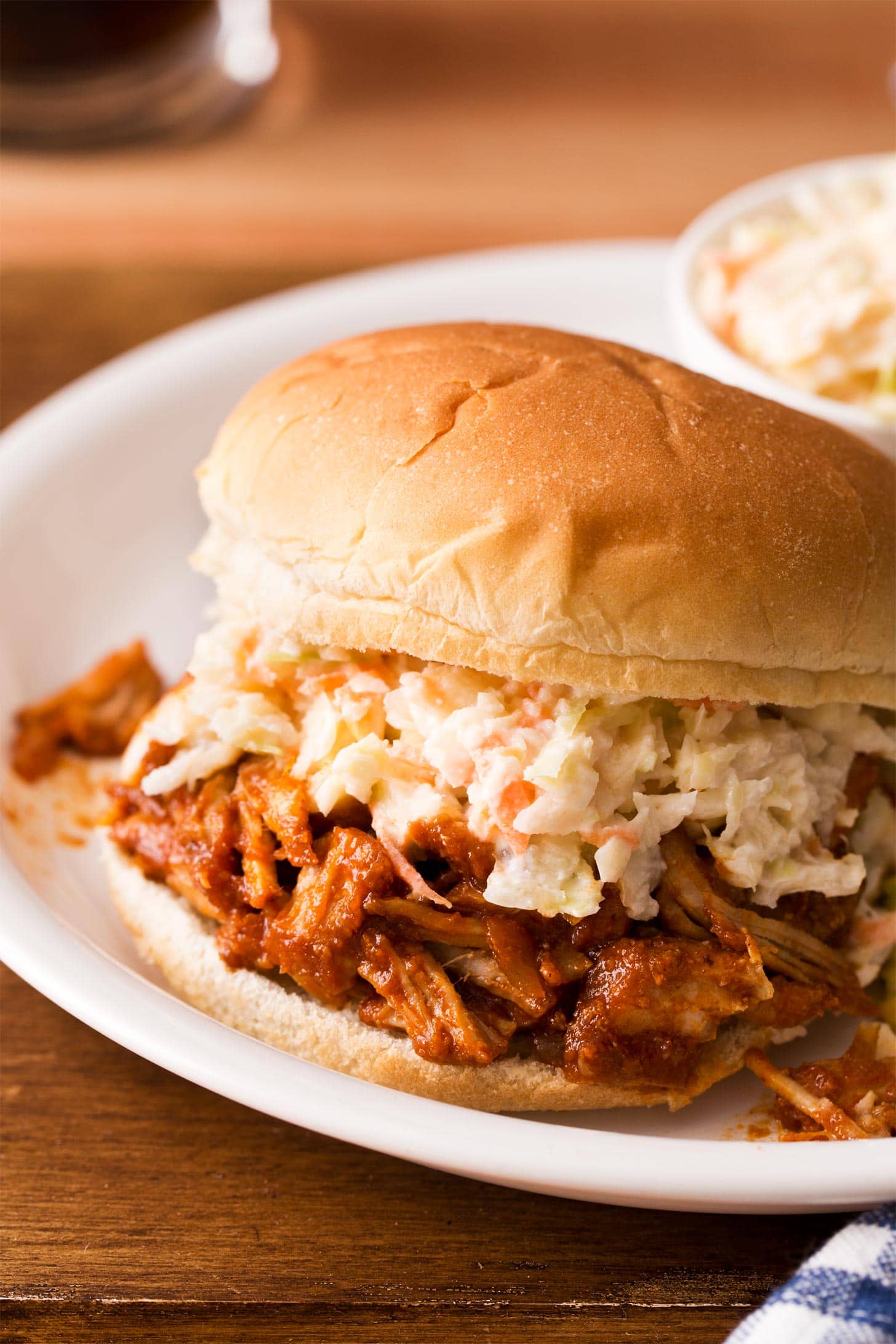 Homemade coleslaw on top of pulled pork