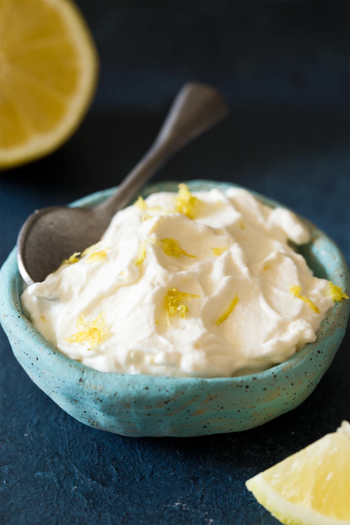 Bowl of lemon whipped cream with spoon