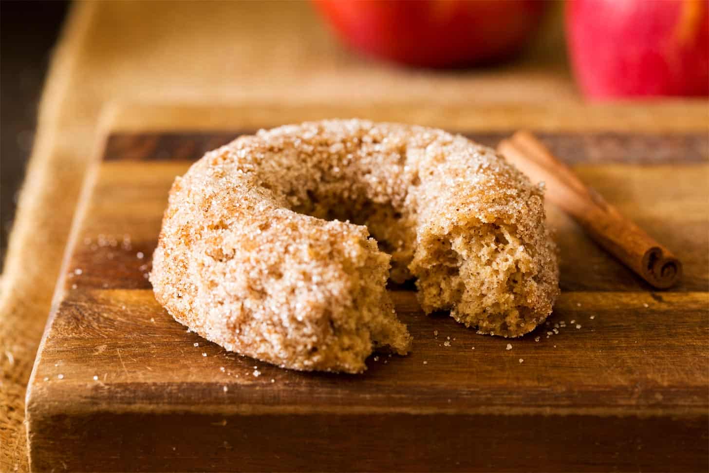 Apple cider donuts with bite taken out