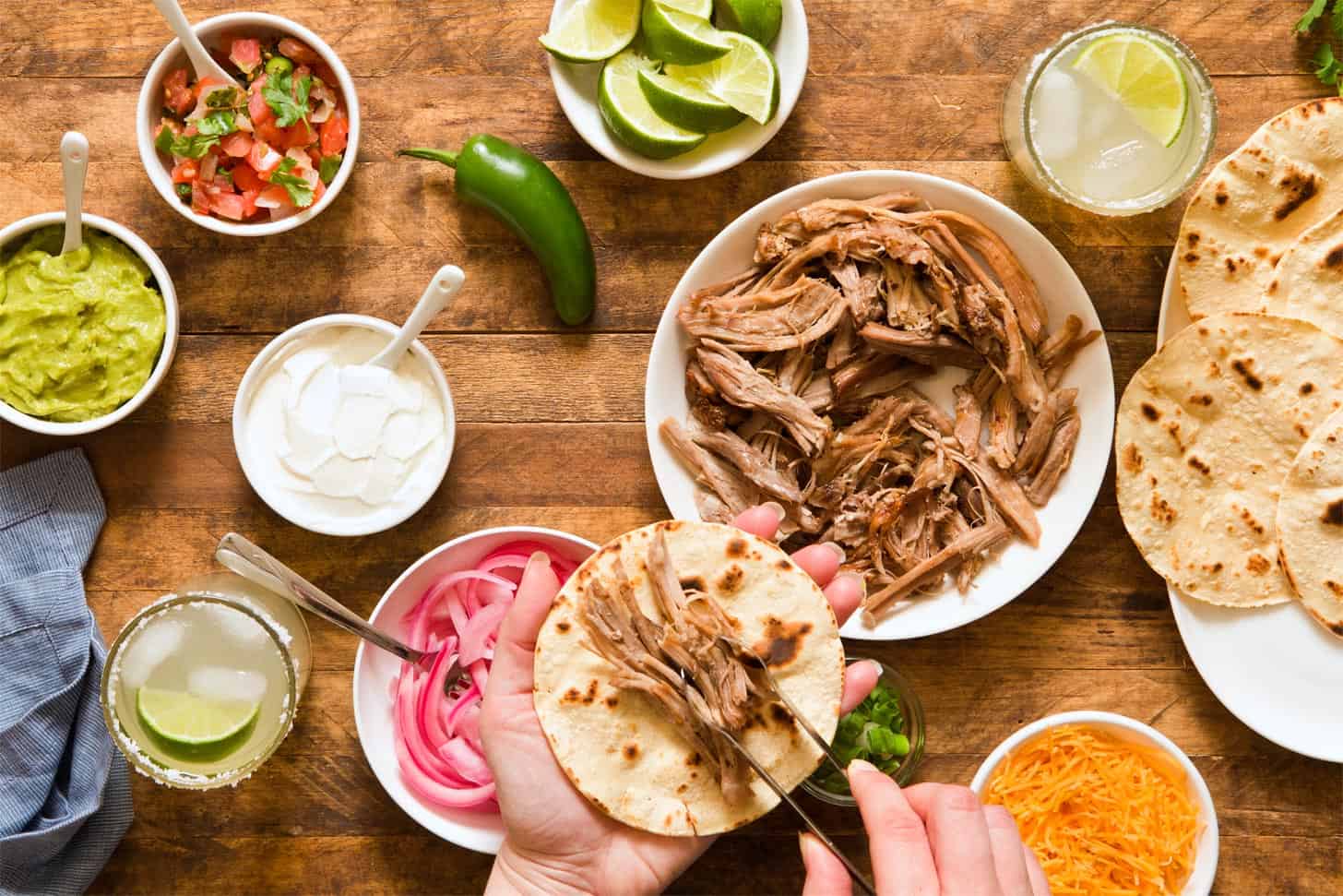 Turning slow cooker carnitas into tacos