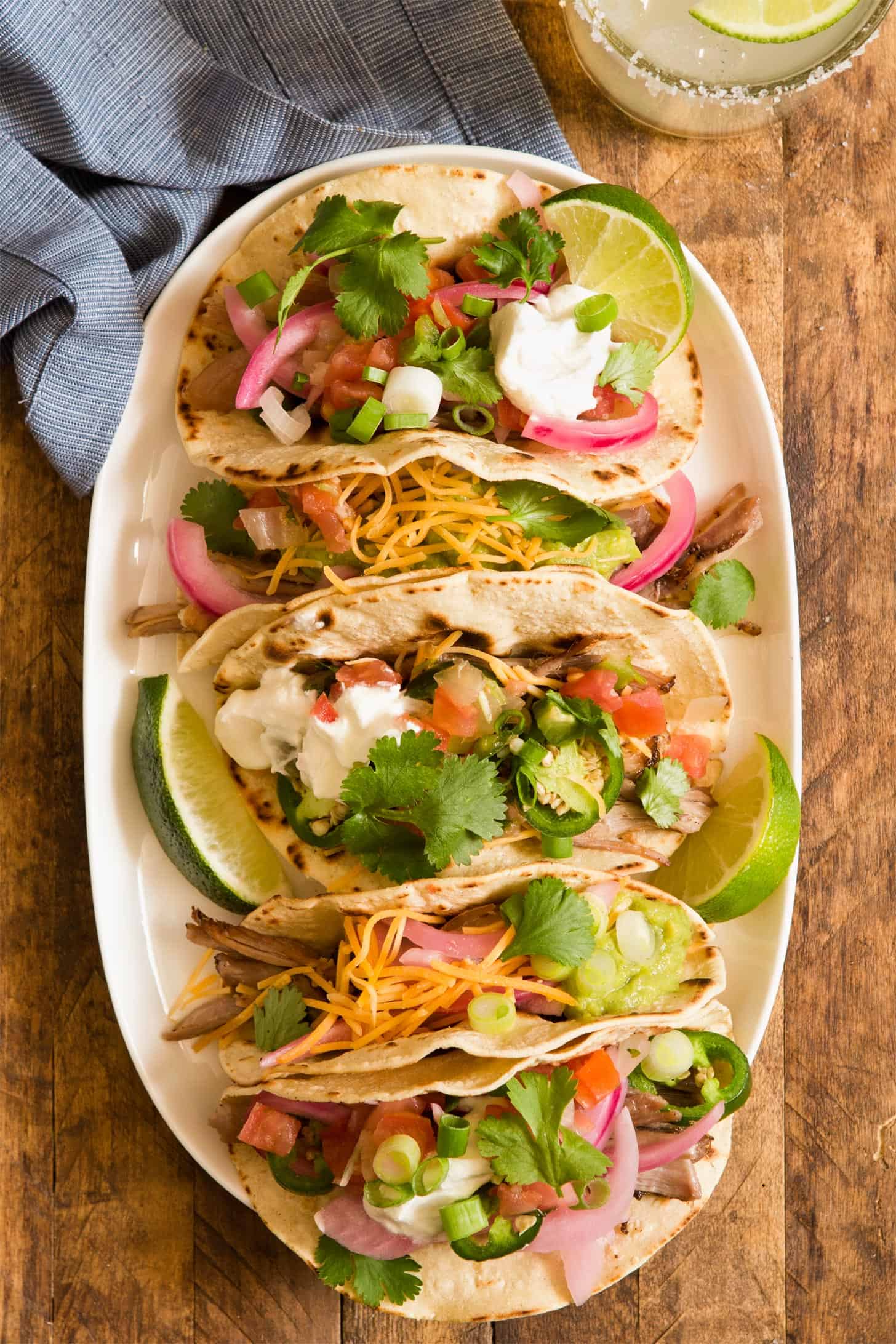 Crock Pot Carnitas assembled into tacos